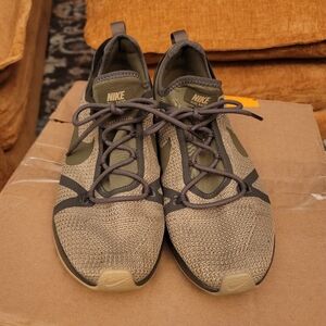 This is a pair of men's Nike Duel Racer shoes in the "Khaki/Medium Olive"